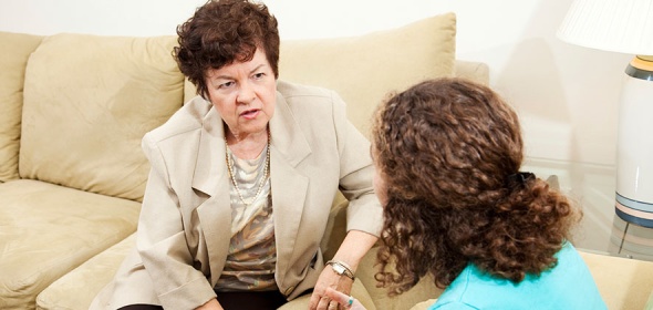 Photo of a peer provider helps a patient with mental health issues