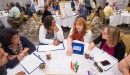 Photo of healthcare fellowship programs participant work in groups 